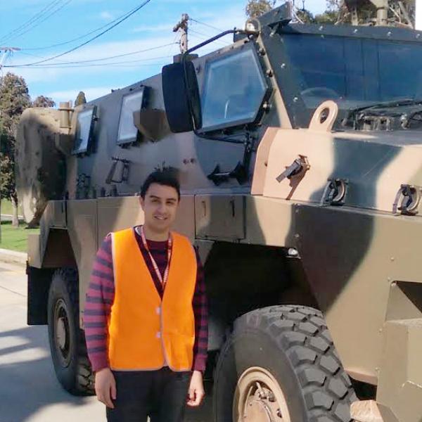 Michael Saleh with defence vehicle