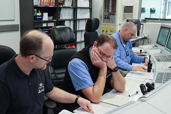 Shift manager and operators test first shutdown system in preparing to re-start the reactor